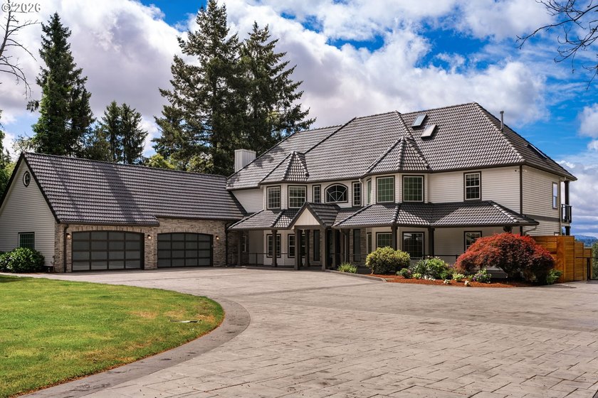 Set within the prestigious Rivercrest community, this - photo 2