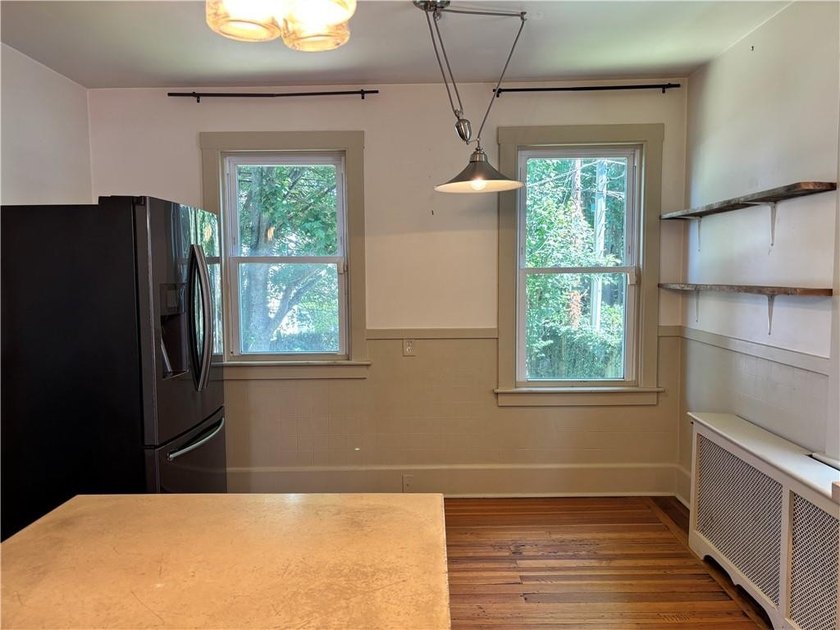 A true diamond in the rough, this classic Newport Dutch Colonial - photo 14