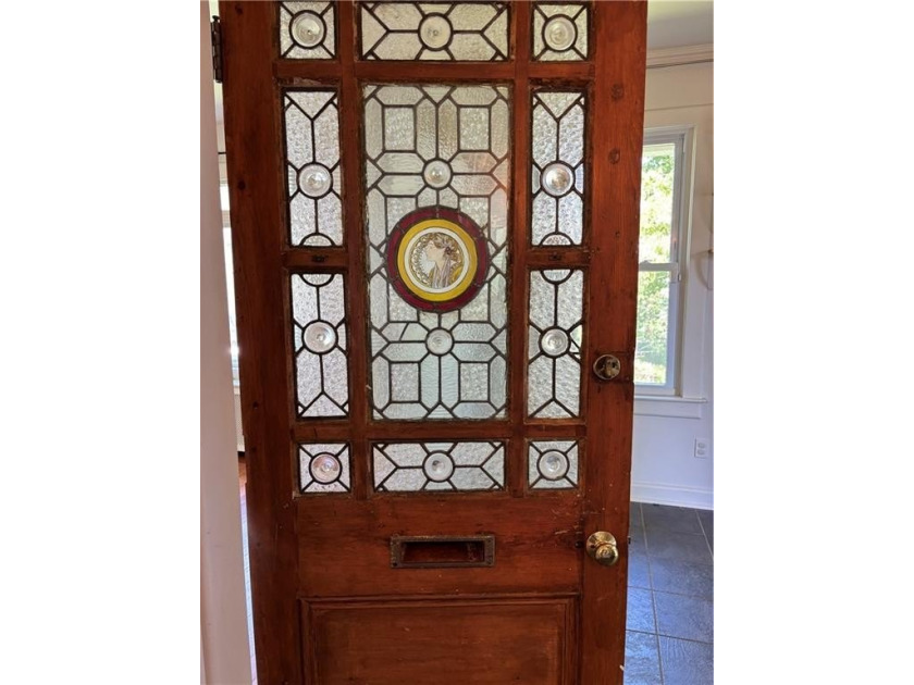 A true diamond in the rough, this classic Newport Dutch Colonial - photo 17