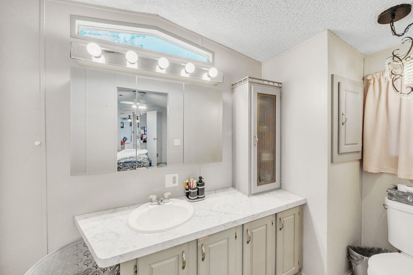 JUST LISTED!!! Lakefront 3BR/2BA with Florida room and tile - photo 40