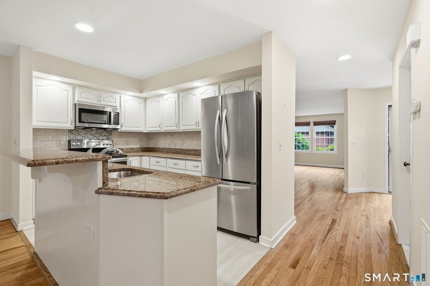 Welcome to Woodfield Village and this two-bedroom unit located - photo 7