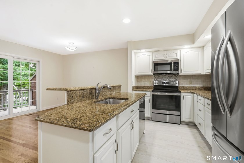 Welcome to Woodfield Village and this two-bedroom unit located - photo 8