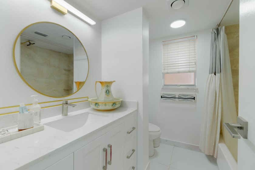 Welcome to this spacious 2-bedroom, 2-bath condominium located - photo 16