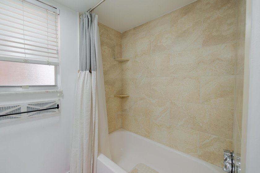 Welcome to this spacious 2-bedroom, 2-bath condominium located - photo 17