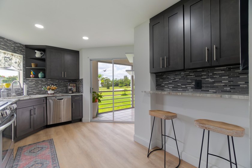 Welcome to this spacious 2-bedroom, 2-bath condominium located - photo 19