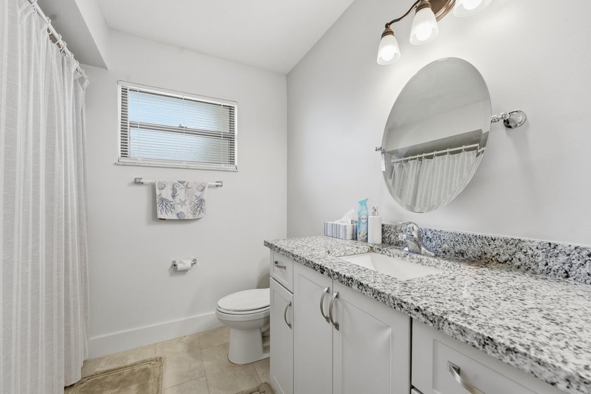 Welcome to this freshly painted 2-bedroom, 2-bathroom pool home - photo 24