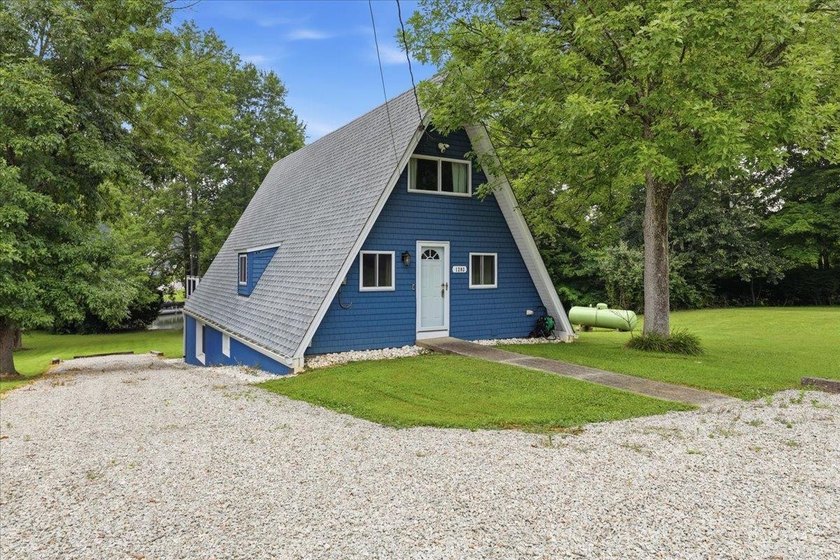 Welcome to 1203 Harz Cove at Lake Lorelei! This fully renovated - photo 5
