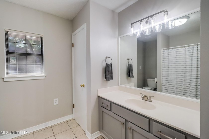 Welcome home to this beautifully updated 3-bedroom, 2-bath - photo 13