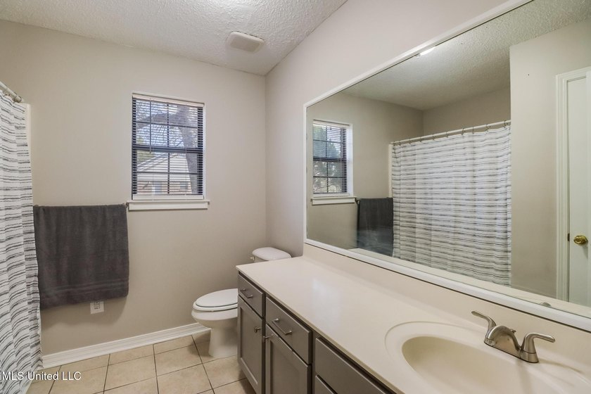 Welcome home to this beautifully updated 3-bedroom, 2-bath - photo 17