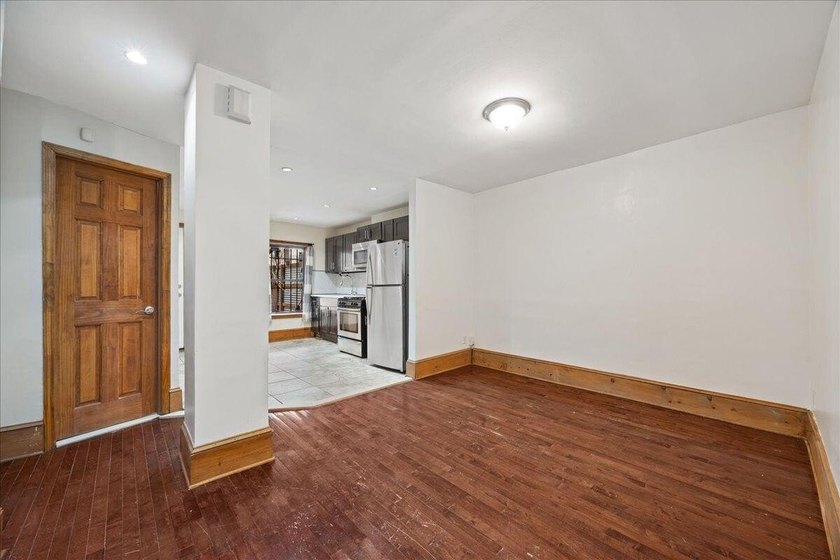 Located in the heart of Bedford-Stuyvesant, this solid brick - photo 3