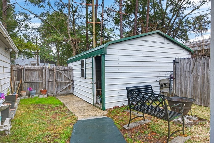 This home is conveniently located Midtown and is move-in ready - photo 31