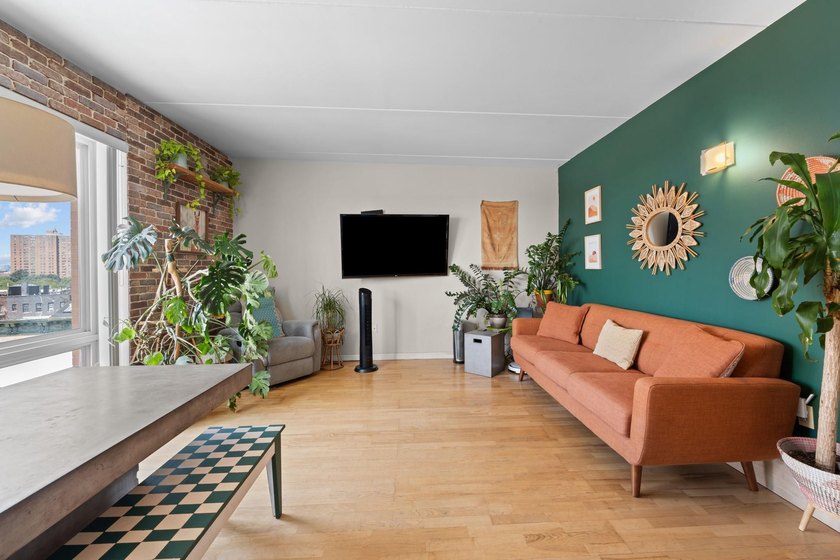 Welcome to 853 Macy Place #8E, a rare top-floor, corner - photo 2