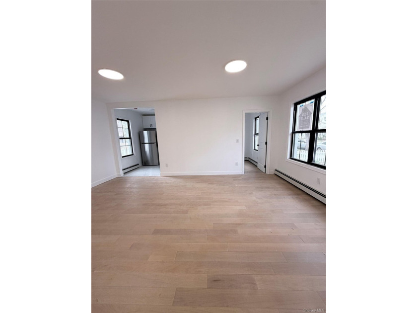Welcome to this beautifully renovated one-family home with an - photo 4