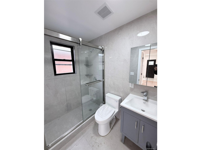 Welcome to this beautifully renovated one-family home with an - photo 7