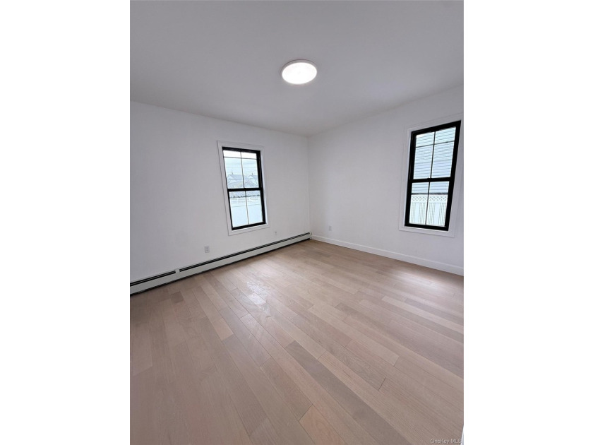 Welcome to this beautifully renovated one-family home with an - photo 8