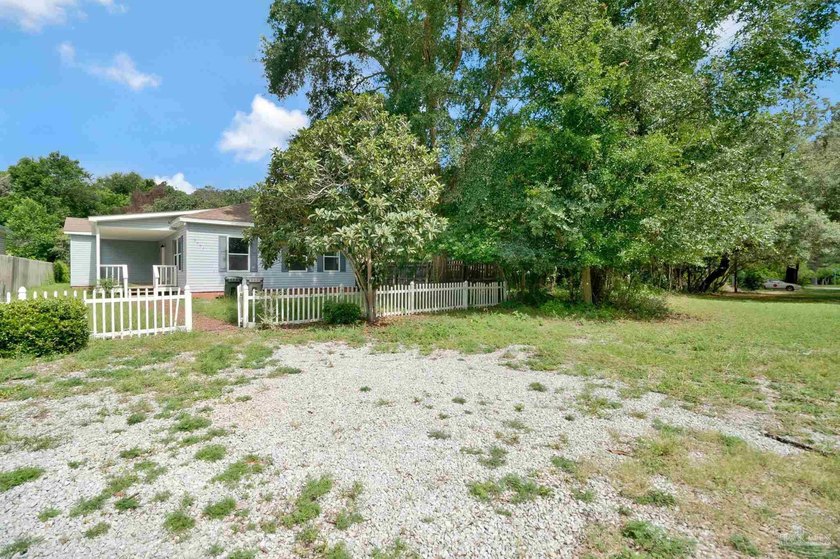 Completely renovated and move-in ready. This 3-bedroom, 2-bath - photo 3