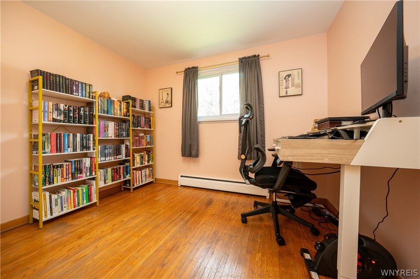 Welcome home to this inviting 4-bedroom, 1.5-bath residence - photo 26