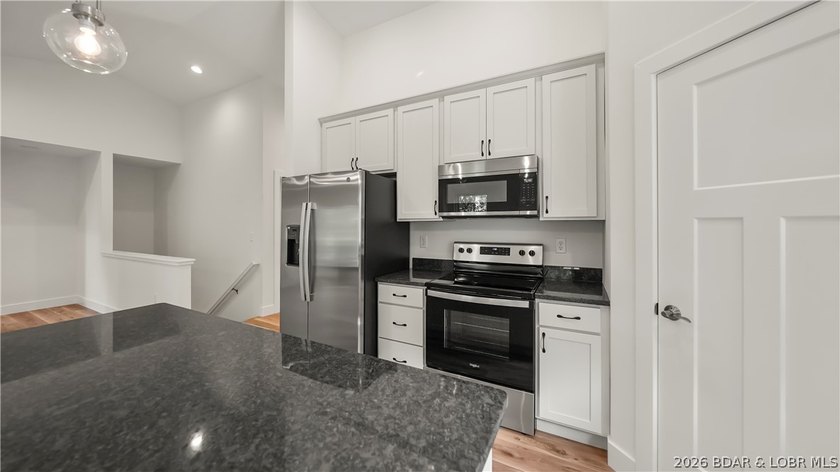 IN THE HEART OF OSAGE BEACH, your Lake of the Ozarks life starts - photo 13