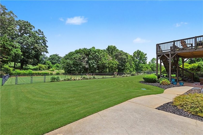 BEAUTIFULLY MAINTAINED 5 BED, 4.5 BATH RANCH HOME ON FINISHED - photo 33