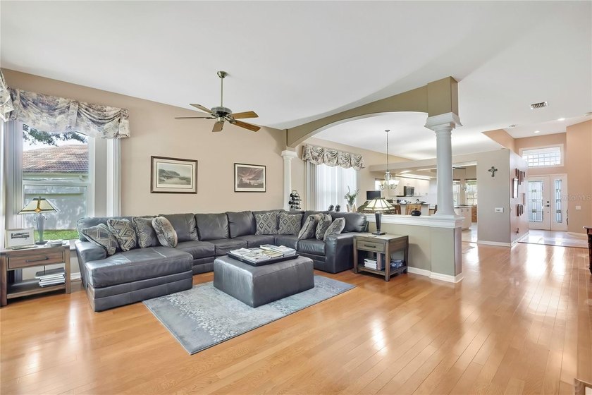 Set within the gated Glen Lakes Golf &amp; Country Club, this 2,238 - photo 2