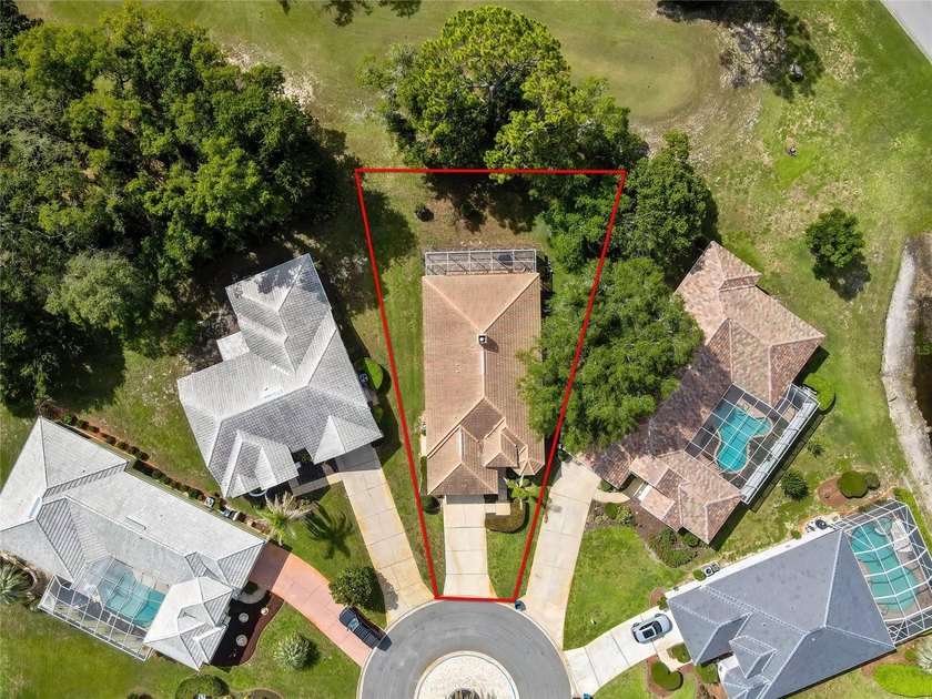 Set within the gated Glen Lakes Golf &amp; Country Club, this 2,238 - photo 5