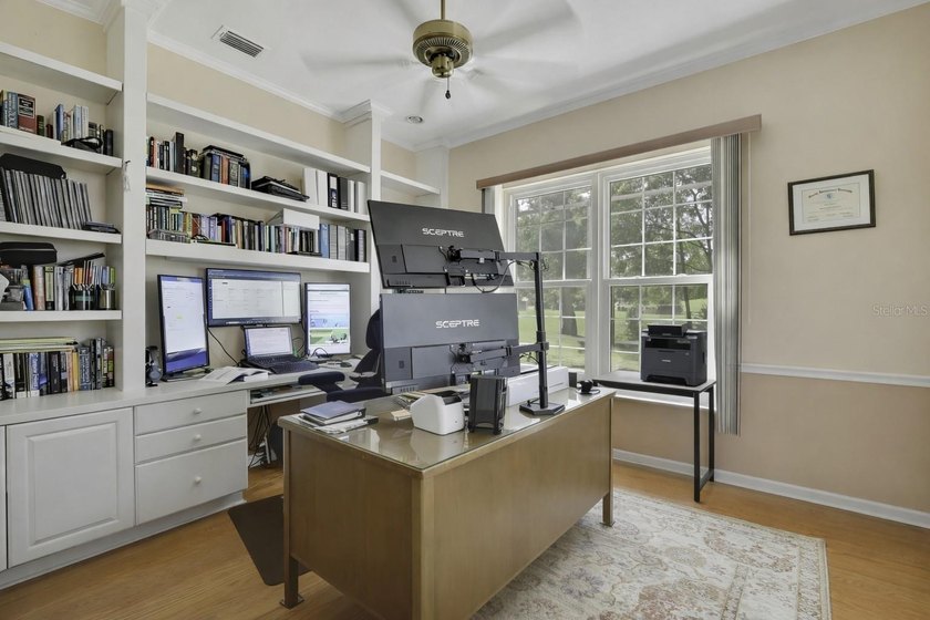 Set within the gated Glen Lakes Golf &amp; Country Club, this 2,238 - photo 8
