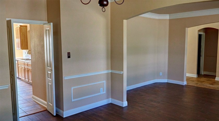 Welcome to this spacious 6-bedroom, 3.5-bath home in one of The - photo 8