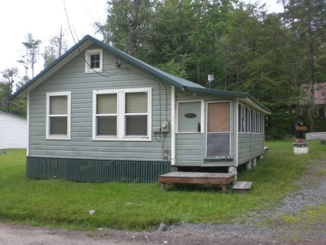 Located on a corner lot, this neat and clean ranch offers easy - photo 6