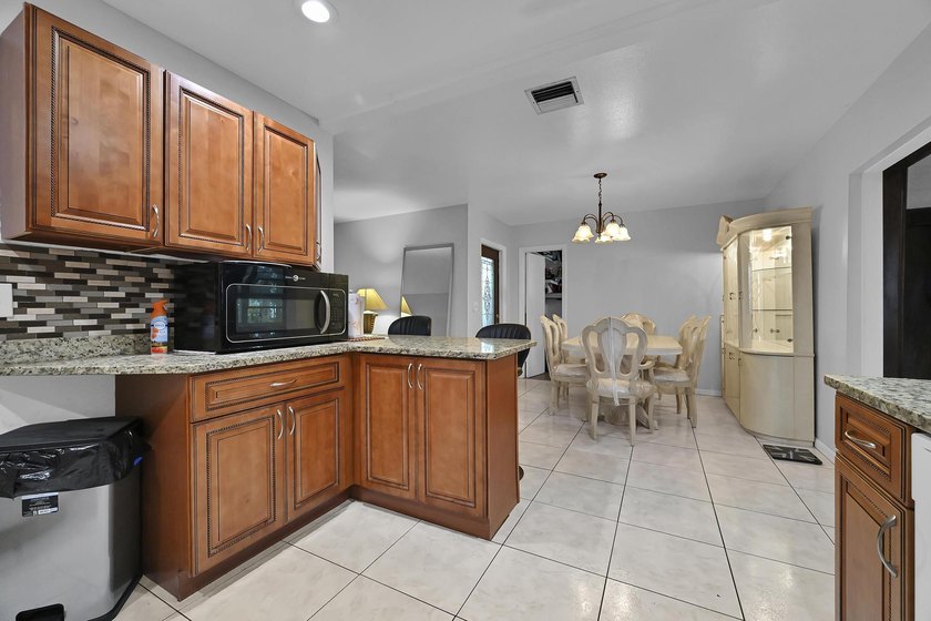 This CBS stucco 3 bedroom, 1.5 bath home offering 1,434 Sq. ft - photo 11