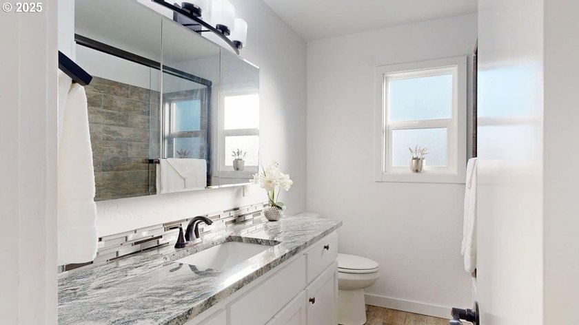 This home has been completely remodeled and updated to today's - photo 16