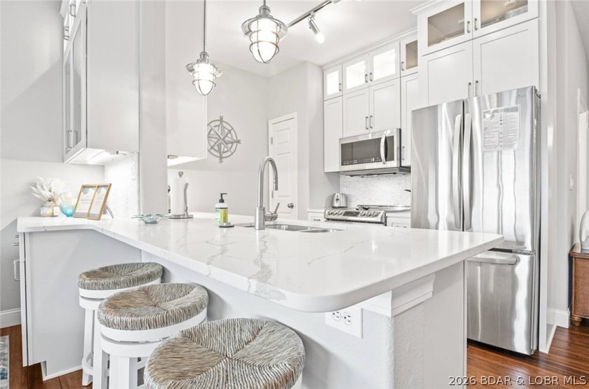 THIS ONE HAS IT ALL! Perched at the penthouse level, this - photo 8