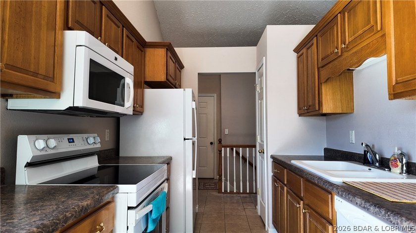 Charming home with walk-out basement in the heart of Camdenton! - photo 5