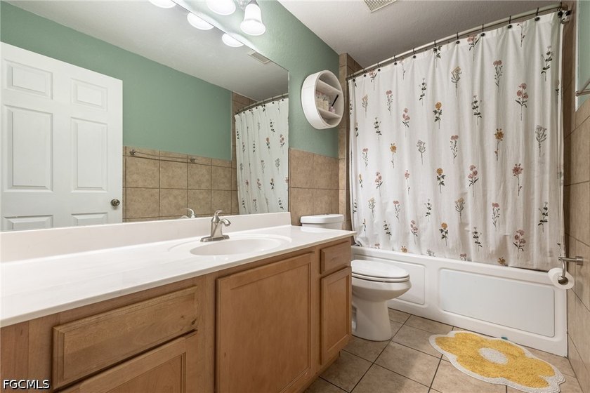 This stunning single-family home boasts 4 spacious bedrooms, 2 - photo 19