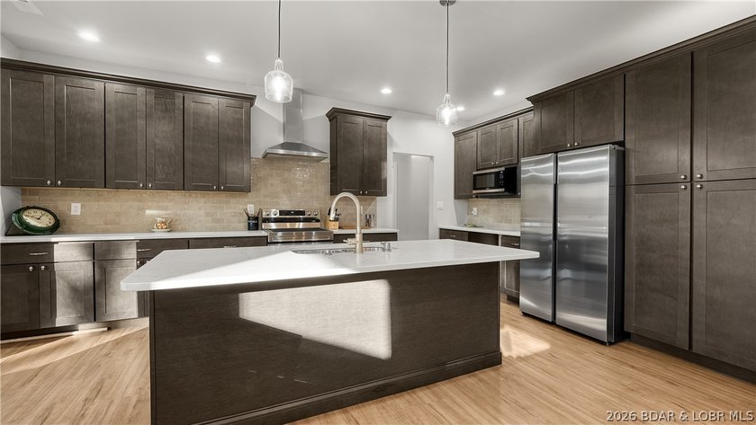 Step into effortless living with this immaculate, newer - photo 7