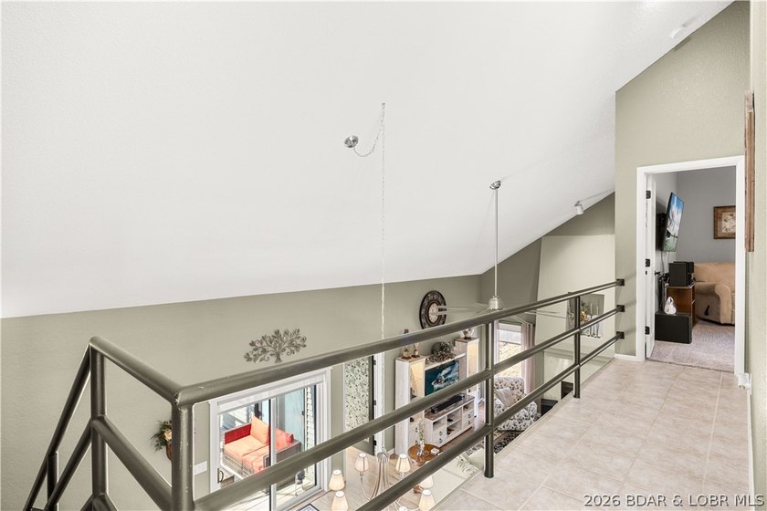 Discover this immaculate 2nd-tier ranch in Linn Creek, boasting - photo 6