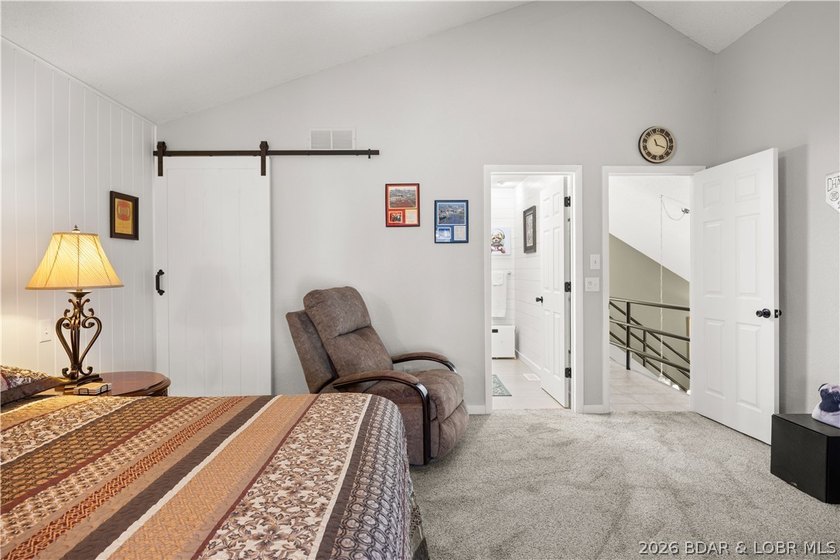 Discover this immaculate 2nd-tier ranch in Linn Creek, boasting - photo 8