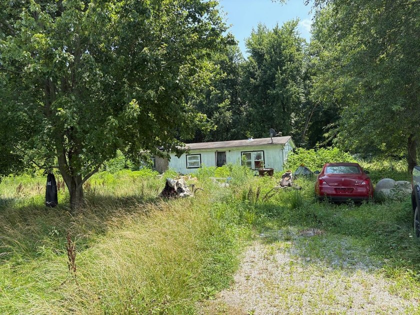 3.85 acres of developed land being sold for land value only! - photo 3