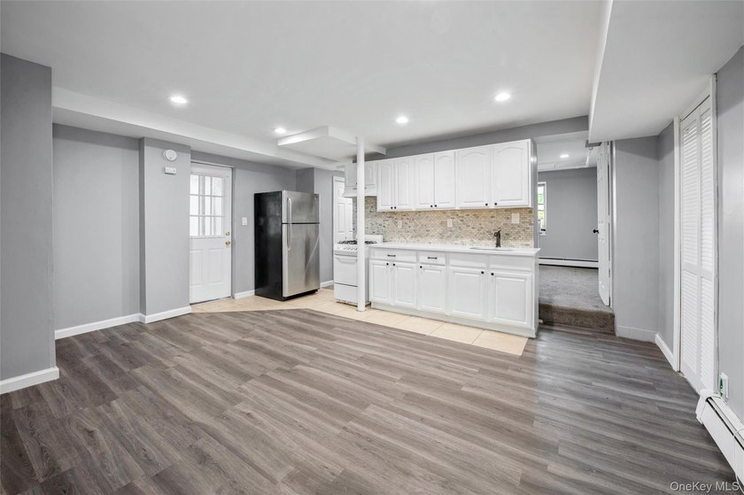 This versatile B3 two-family home has been thoughtfully - photo 25