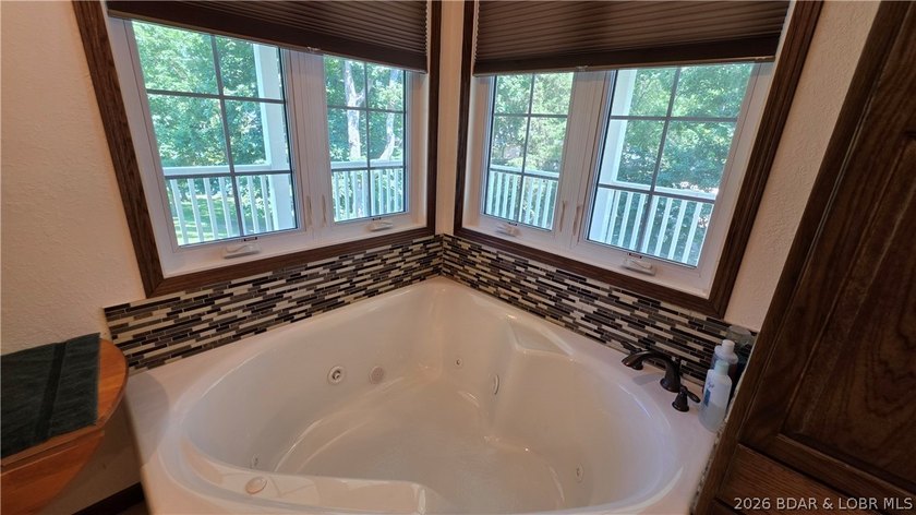 Lakefront Oasis! Discover this exceptional 5,200+ sq ft custom - photo 13