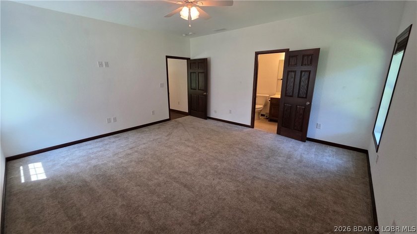 Lakefront Oasis! Discover this exceptional 5,200+ sq ft custom - photo 28