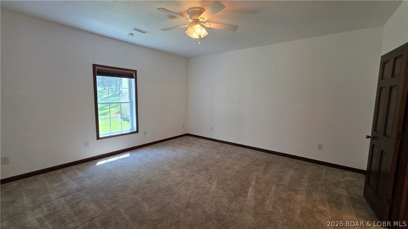 Lakefront Oasis! Discover this exceptional 5,200+ sq ft custom - photo 31