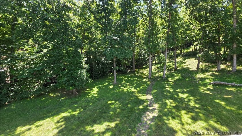 Lakefront Oasis! Discover this exceptional 5,200+ sq ft custom - photo 43
