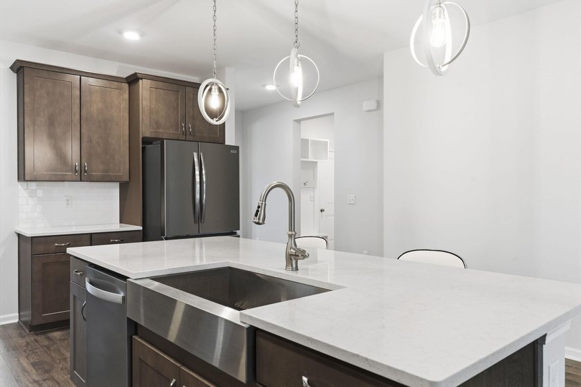 This popular Beazer Hickory model, built in April 2025, offers a - photo 11