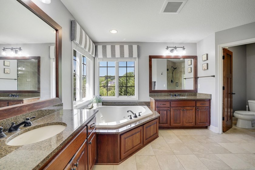 Welcome to 4270 Wild Meadows Drive, an exceptional two-story - photo 19