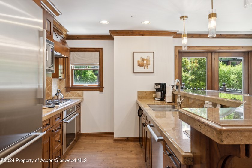 Own a recently updated, two-story corner unit one block from - photo 8