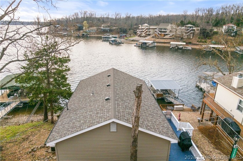 Discover the ultimate lakefront retreat with this stunningly - photo 4