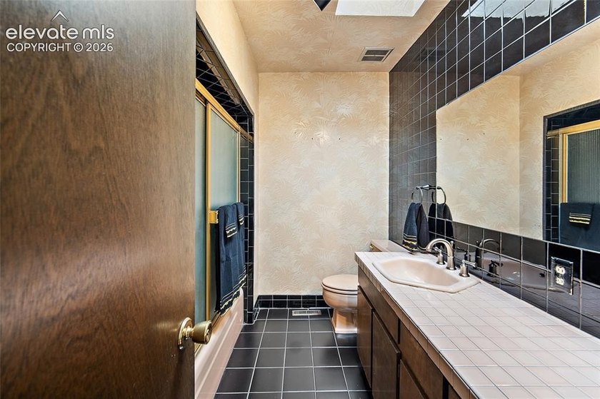 Welcome to this exceptional 5-bedroom, 3-bathroom home in Skyway - photo 23