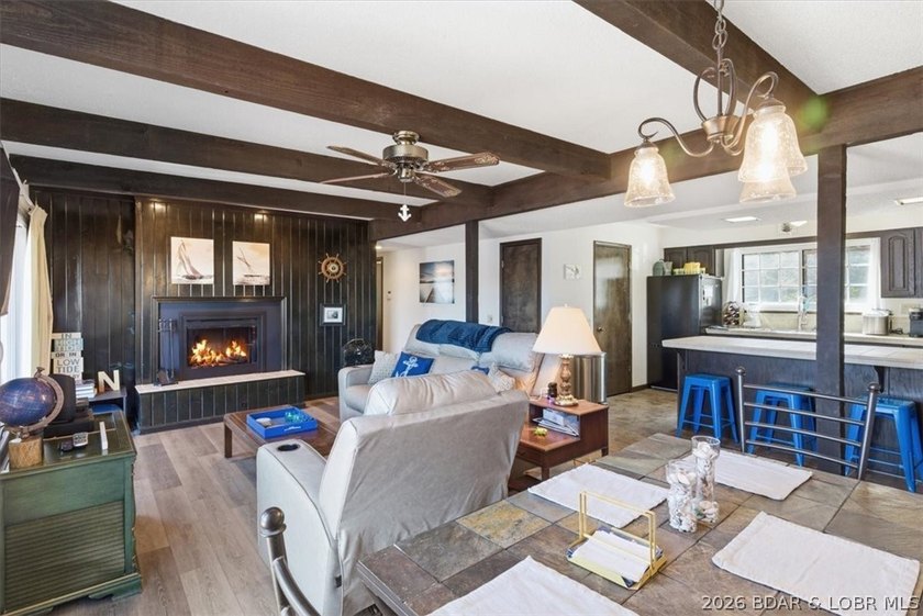 Looking for the perfect lake retreat? This Osage Heritage condo - photo 3