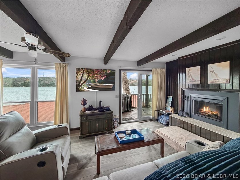Looking for the perfect lake retreat? This Osage Heritage condo - photo 6
