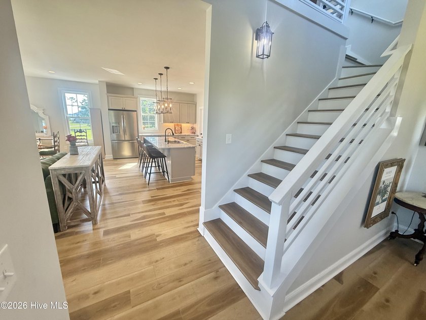 Discover elevated coastal living in Whittaker Point, one of - photo 9
